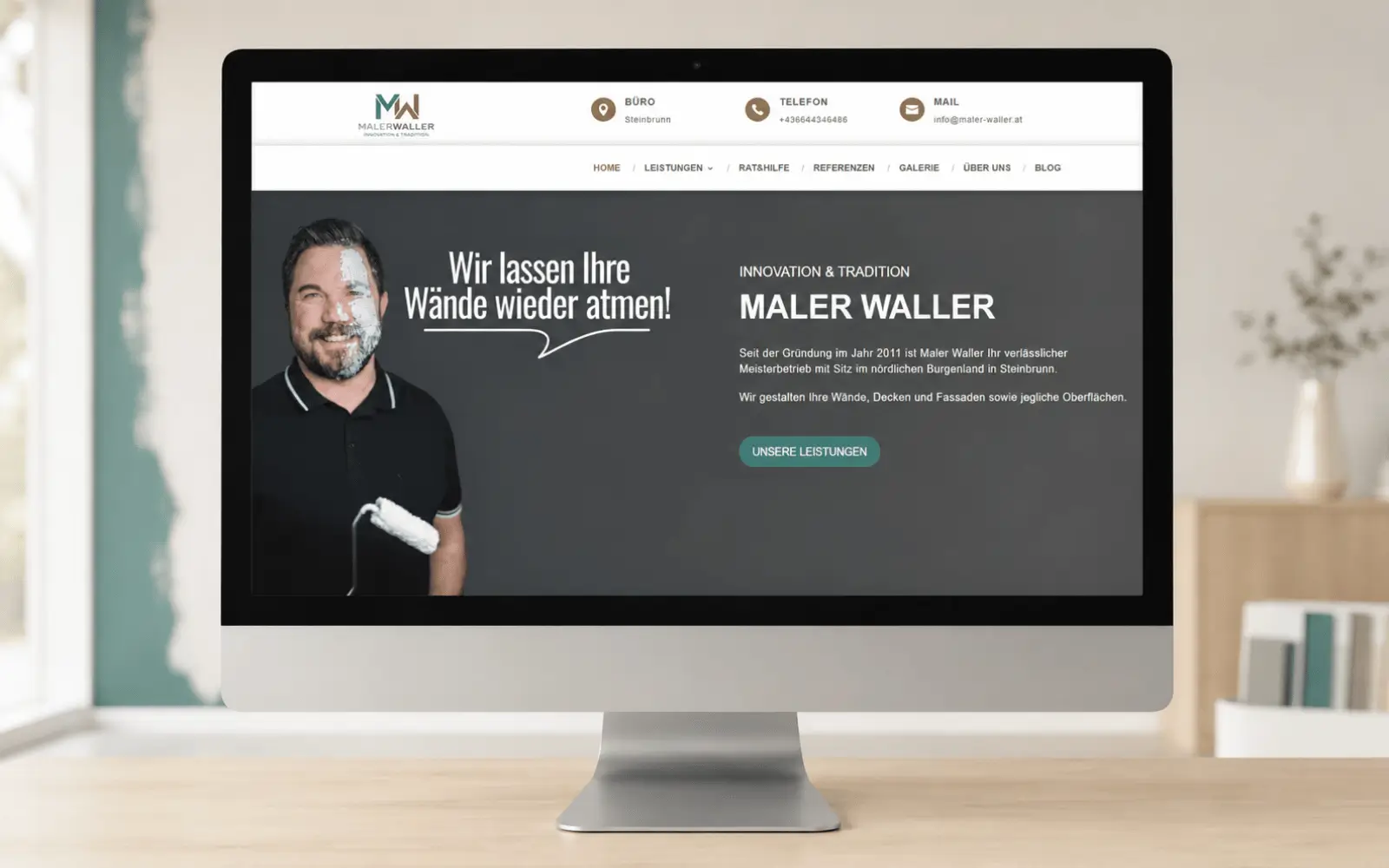 Desktop-Ansicht der Startseite von Malerwaller in einem Monitor-Mockup